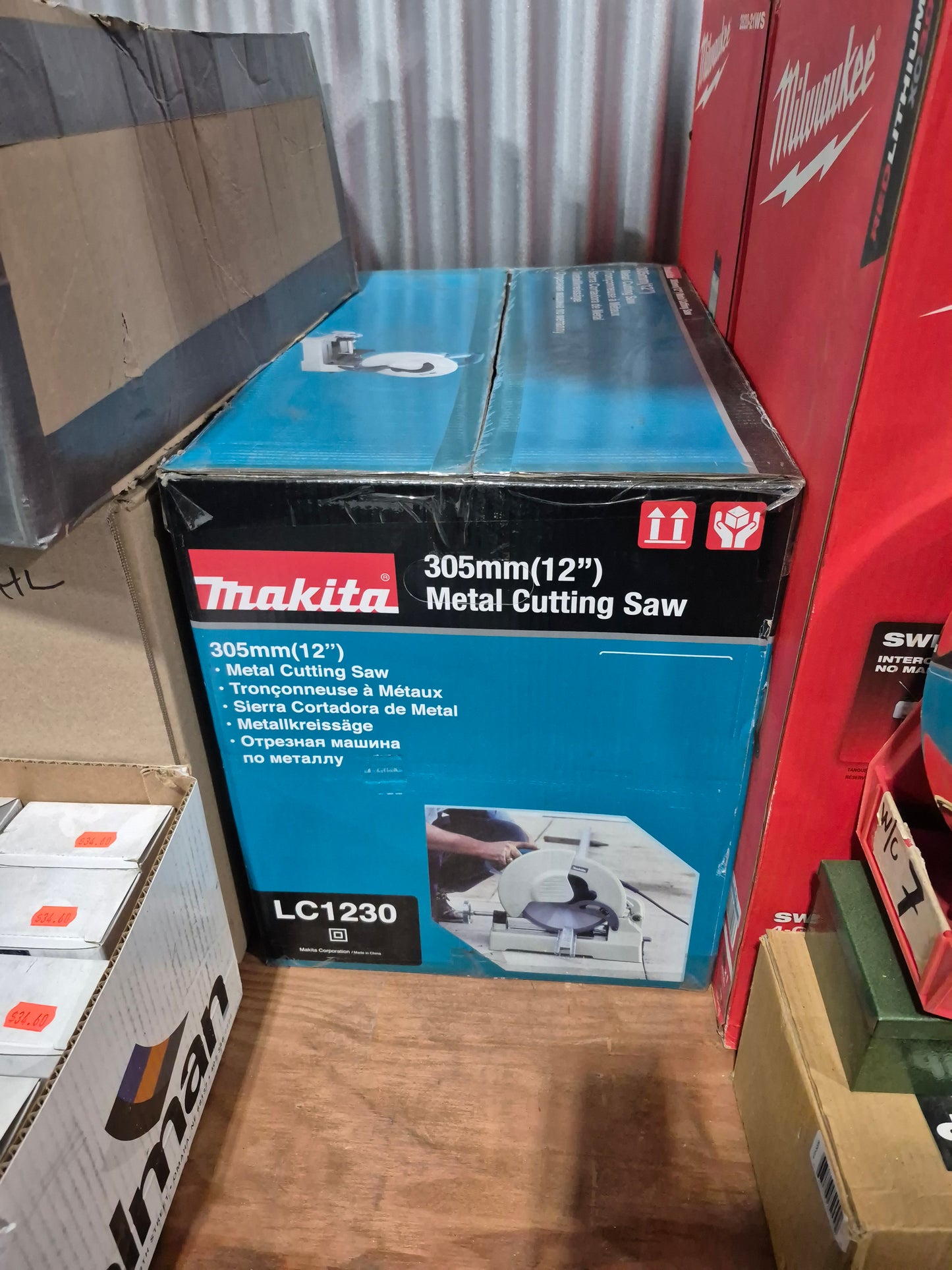 Makita 12" Metal Cutting Saw LC1230 - INCLUDES : Carbide tipped blade, socket wrench, switch button and safety goggles